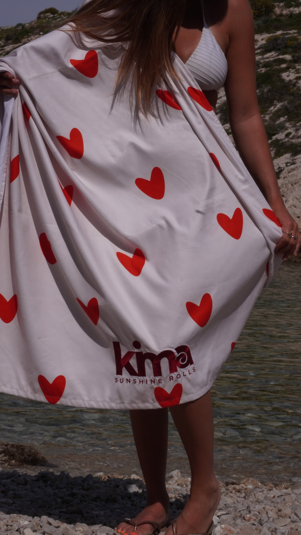 Serviette de plage Kima Amour Rouge à la plage