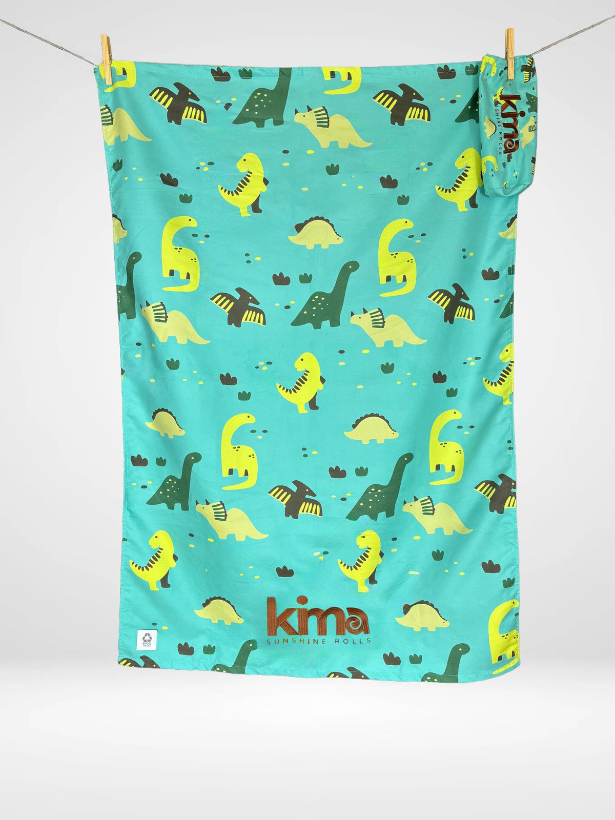 Serviette de plage enfant Kima Mesco Dino, turquoise à dinosaures, à plat - Ô Cabanon La Ciotat