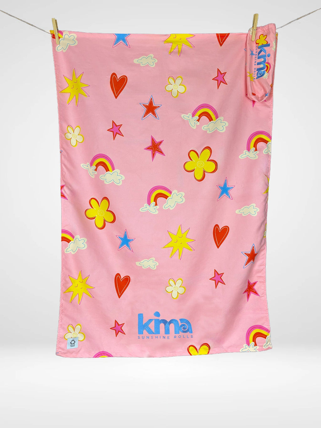 Serviette de plage enfant Kima Rainbow Pink, rose, arcs-en-ciel et fleurs, à plat - Ô Cabanon La Ciotat